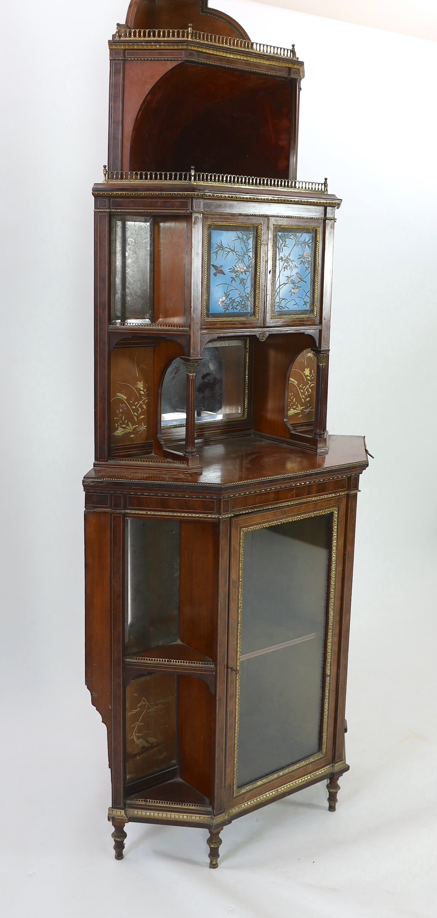 An unusual Anglo-Japanese inlaid mahogany standing corner cabinet, by Holland & Sons, c.1880, width 98cm, height 258cm